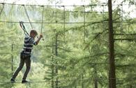 Person walking the tightrope